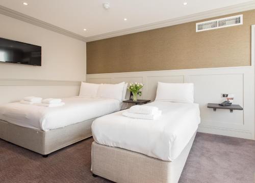 Habitación Triple del hotel Mowbray Court