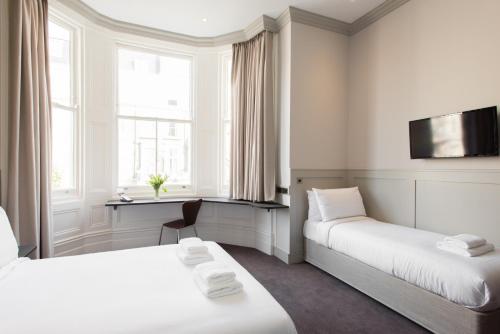 Habitación Triple del hotel Mowbray Court. Foto 3