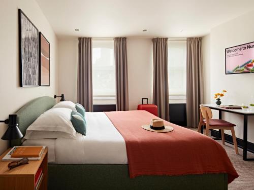 Habitación mediana del hotel Numa London Bloomsbury. Foto 7