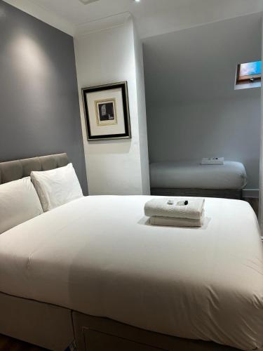 Habitación Triple Deluxe del hotel The Park. Foto 18