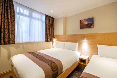 Habitación Triple Estándar del hotel Comfort Inn Hyde Park