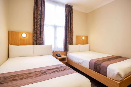 Habitación Familiar - No fumadores del hotel Comfort Inn Hyde Park. Foto 1