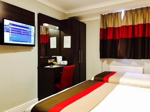 Habitación Triple del hotel Royal Cambridge. Foto 3