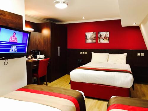 Habitación cuádruple del hotel Royal Cambridge. Foto 1