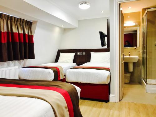 Habitación cuádruple del hotel Royal Cambridge. Foto 4