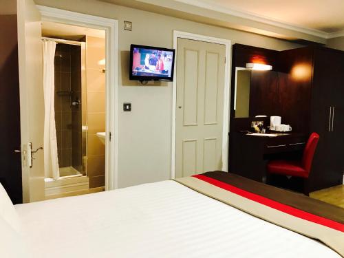 Habitación Familiar Clásica del hotel Royal Cambridge. Foto 4