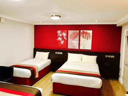 Habitación Familiar Clásica del hotel Royal Cambridge. Foto 6