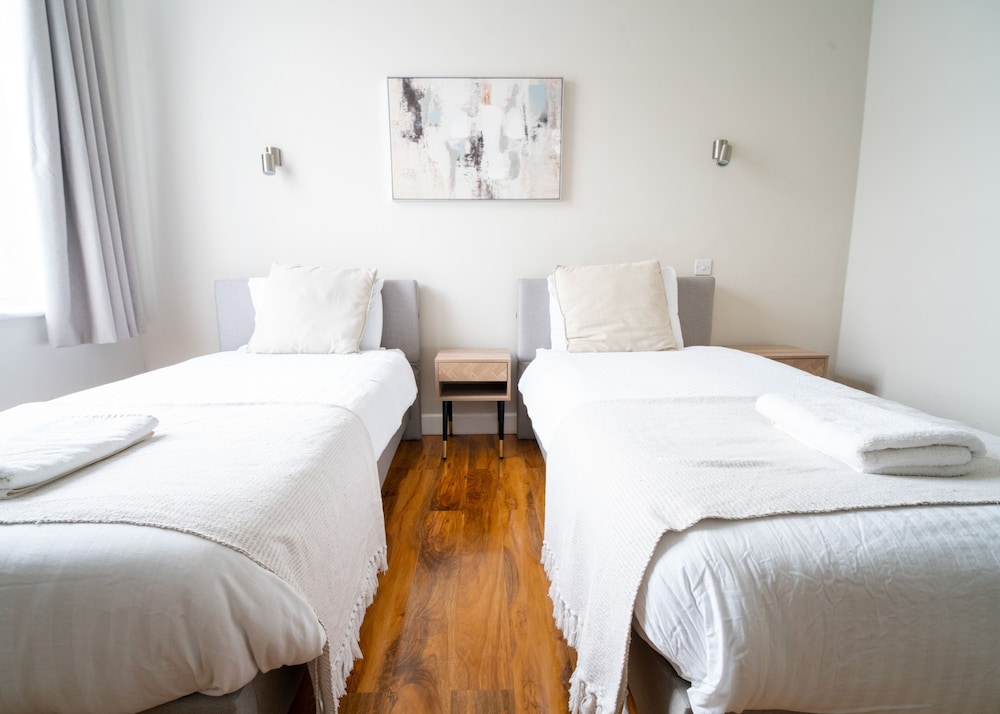 Habitación con 2 camas individuales del hotel Rushmore. Foto 10