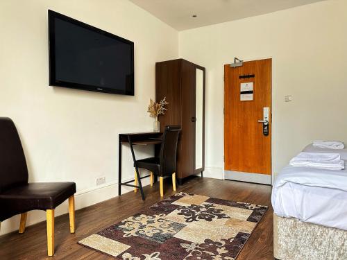 Habitación Doble Estándar - 2 camas del hotel OYO Somerset Baker Street London. Foto 12