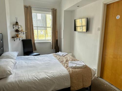 Habitación Doble Estándar del hotel OYO Somerset Baker Street London. Foto 4