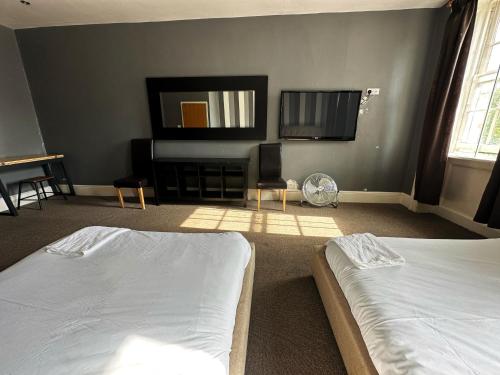 Habitación Cuádruple Estándar del hotel OYO Somerset Baker Street London. Foto 3