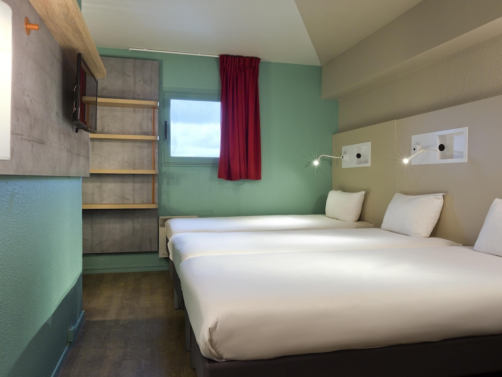 TRIPLE - Habitación con 3 camas individuales del hotel ibis budget Chilly-Mazarin Les Champarts