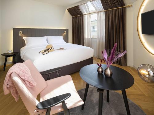 Habitación Deluxe con cama extragrande del hotel Am Konzerthaus - MGallery Collection