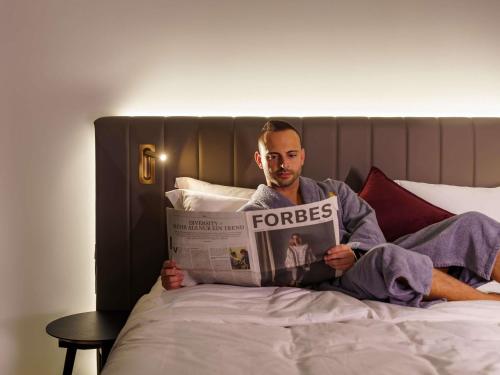 Suite con cama extragrande del hotel Am Konzerthaus - MGallery Collection. Foto 1