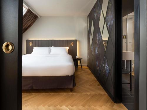 Suite con cama extragrande del hotel Am Konzerthaus - MGallery Collection. Foto 2