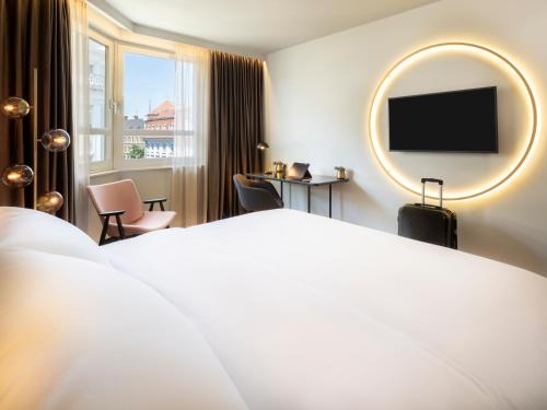 Habitación Superior con cama extragrande del hotel Am Konzerthaus - MGallery Collection. Foto 15