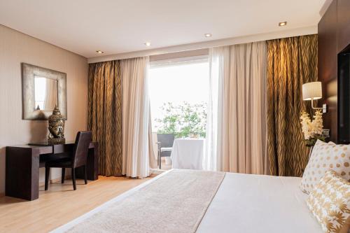 Suite del hotel Oh Nice Ulises Ceuta. Foto 1