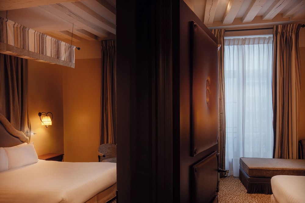 Habitación Familiar para 4 personas del hotel Odeon Saint Germain. Foto 1