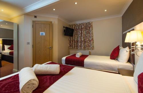 Habitación Doble Estándar con 2 camas dobles del hotel Best Western Buckingham Palace Rd. Foto 3