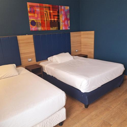 Habitación cuádruple del hotel Idea Milano San Siro. Foto 2