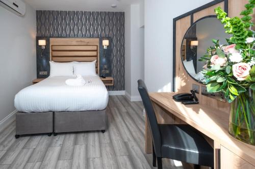 Estudio con 1 cama doble, 1 cama individual y zona de cocina - No fumadores del hotel Best Western Chiswick Palace and Suites. Foto 17