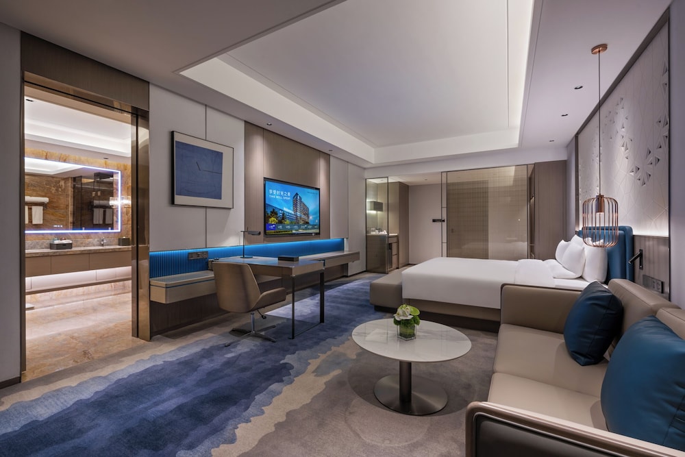 Habitación ejecutiva, 1 cama de matrimonio grande del hotel Novotel Kunshan Yangcheng Lake. Foto 2