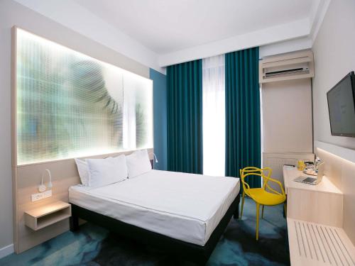 Habitación Doble Estándar del hotel ibis Styles Dunarea Galati. Foto 3