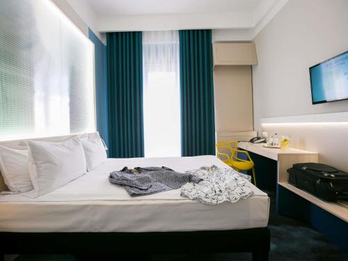 Habitación Doble Estándar del hotel ibis Styles Dunarea Galati. Foto 4