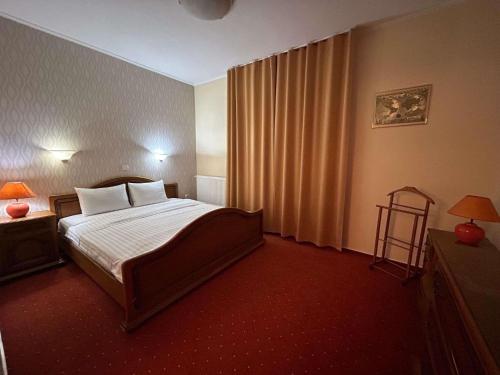 Suite con 1 cama doble del hotel ibis Styles Dunarea Galati. Foto 2