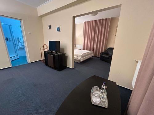 Suite con 1 cama doble del hotel ibis Styles Dunarea Galati. Foto 7