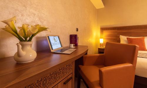 Habitación Doble Privilege del hotel Dellarosa Boutique and Spa. Foto 4