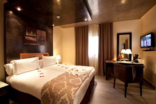 Habitación Doble Privilege del hotel Dellarosa Boutique and Spa. Foto 5