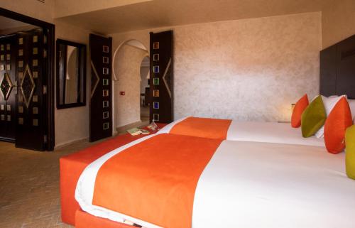 Habitación Cuádruple de Lujo del hotel Dellarosa Boutique and Spa. Foto 5