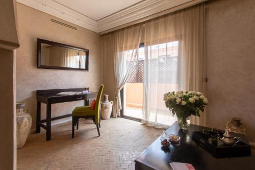 Habitación Cuádruple de Lujo del hotel Dellarosa Boutique and Spa. Foto 7