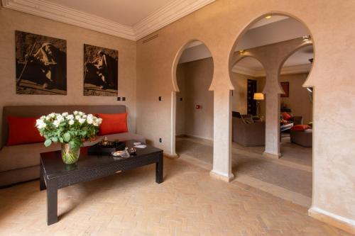 Habitación Cuádruple de Lujo del hotel Dellarosa Boutique and Spa. Foto 8