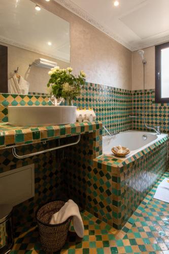 Habitación Cuádruple de Lujo del hotel Dellarosa Boutique and Spa. Foto 14