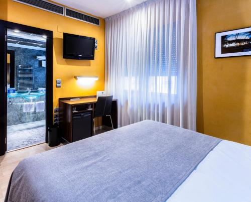 Habitación Doble del hotel Gran Via. Foto 7