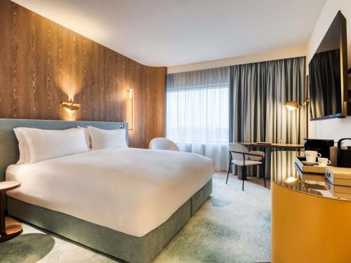 Habitación Doble Estándar del hotel Mövenpick Brussels Airport. Foto 2