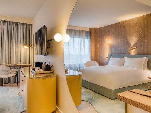 Habitación Doble Estándar del hotel Mövenpick Brussels Airport. Foto 7