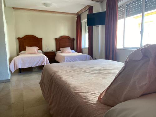 Habitación Cuádruple del hotel Medina Centro