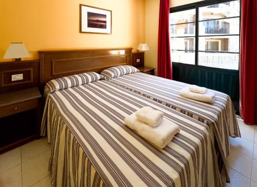 Apartamento de 1 dormitorio con balcón y vistas al mar del hotel Complejo Las Tres Palmeras
