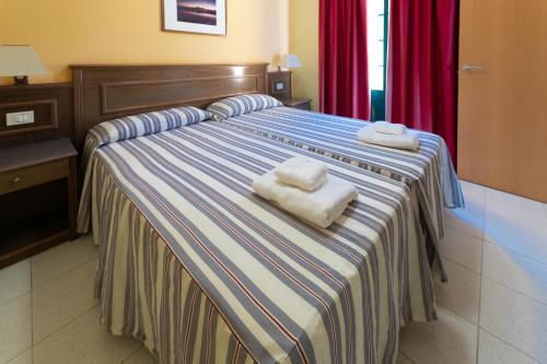 Apartamento de 1 dormitorio con balcón y vistas al mar del hotel Complejo Las Tres Palmeras. Foto 8