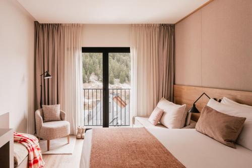 Habitación Deluxe Vall D'Aran del hotel MIM Baqueira Member of Melia Collection. Foto 1