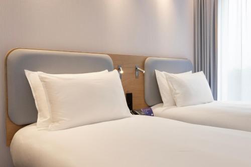 Habitación Doble Estándar con desayuno gratuito - 2 camas del hotel Holiday Inn Express Brussels - Airport, an IHG Hotel