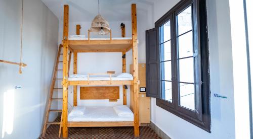 Habitación Compartida Mixta de 6 camas del hotel Las Palmas Rooftop Hostel. Foto 5