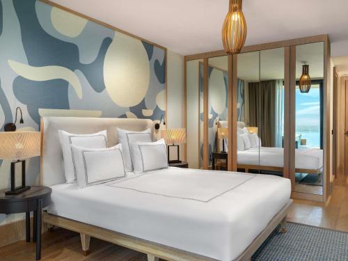 Suite Familiar con 3 dormitorios y vistas al mar del hotel Del\'Mare Reserve Hotel & Spa Bodrum. Foto 3