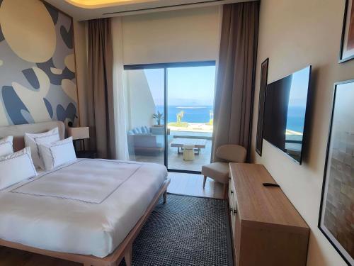 Suite Familiar con 3 dormitorios y vistas al mar del hotel Del\'Mare Reserve Hotel & Spa Bodrum. Foto 6