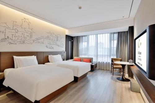 Superior Twin del hotel UrCove by Hyatt Jiashan Centre