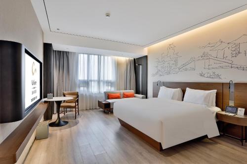 Business Deluxe King del hotel UrCove by Hyatt Jiashan Centre