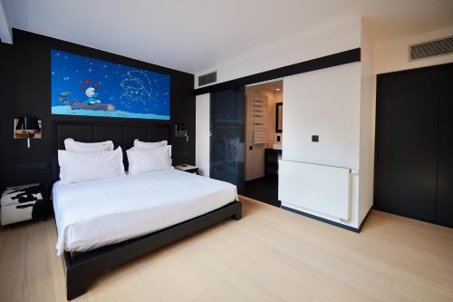 Habitación Familiar con balcón del hotel Yooma Urban Lodge. Foto 1